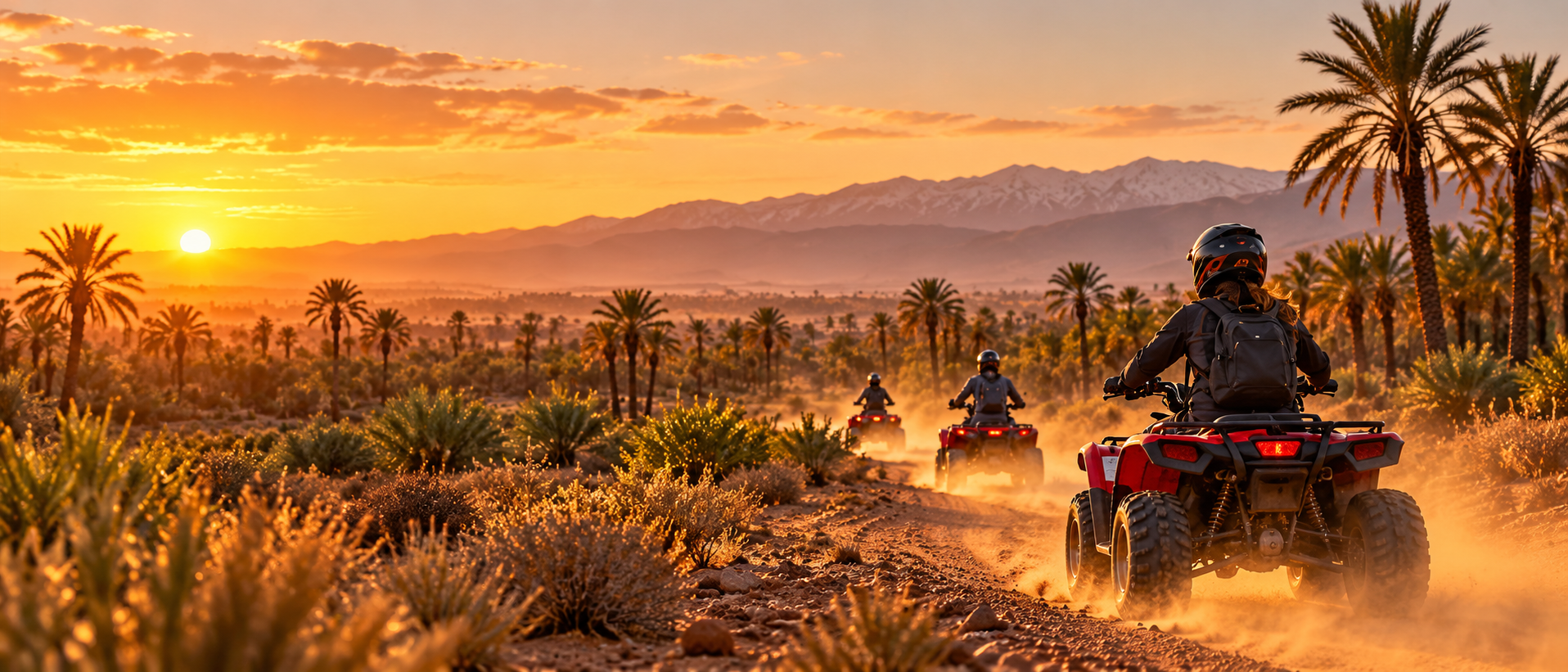 Quad bike riders travelling through Marrakech Palmeraie at sunset